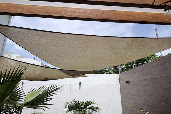 CRTHTR360: Voile d’ombrage nomade triangulaire Coolaroo 3,6 m